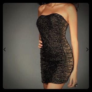 Black La Femme brand sequin dress with sheer sides